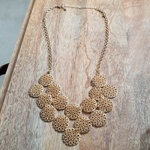 Gold colored necklace
